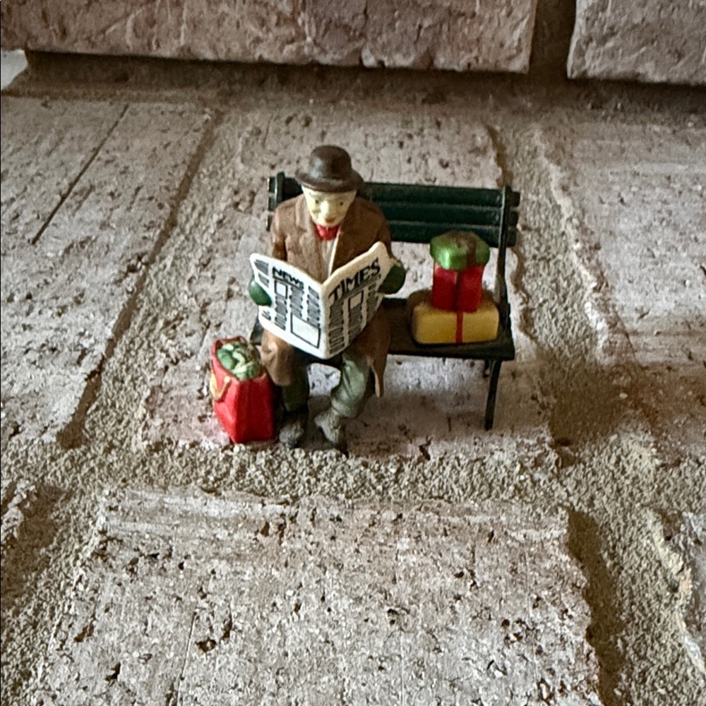 Department 56 "Rest Ye Merry Gentleman" figurine, hand-painted porcelain